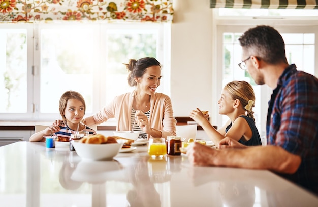 Happy family at dining table